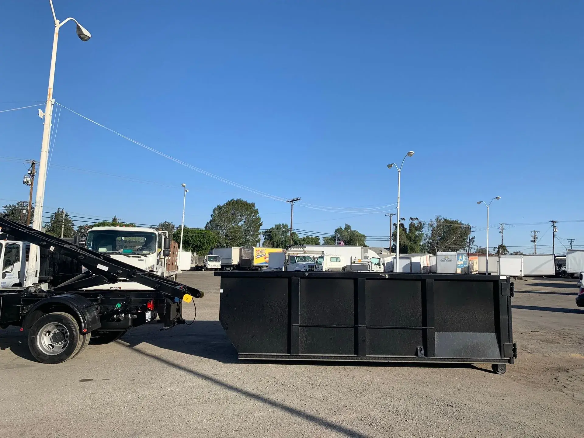 Junk Master crew loading a truck during a property cleanout