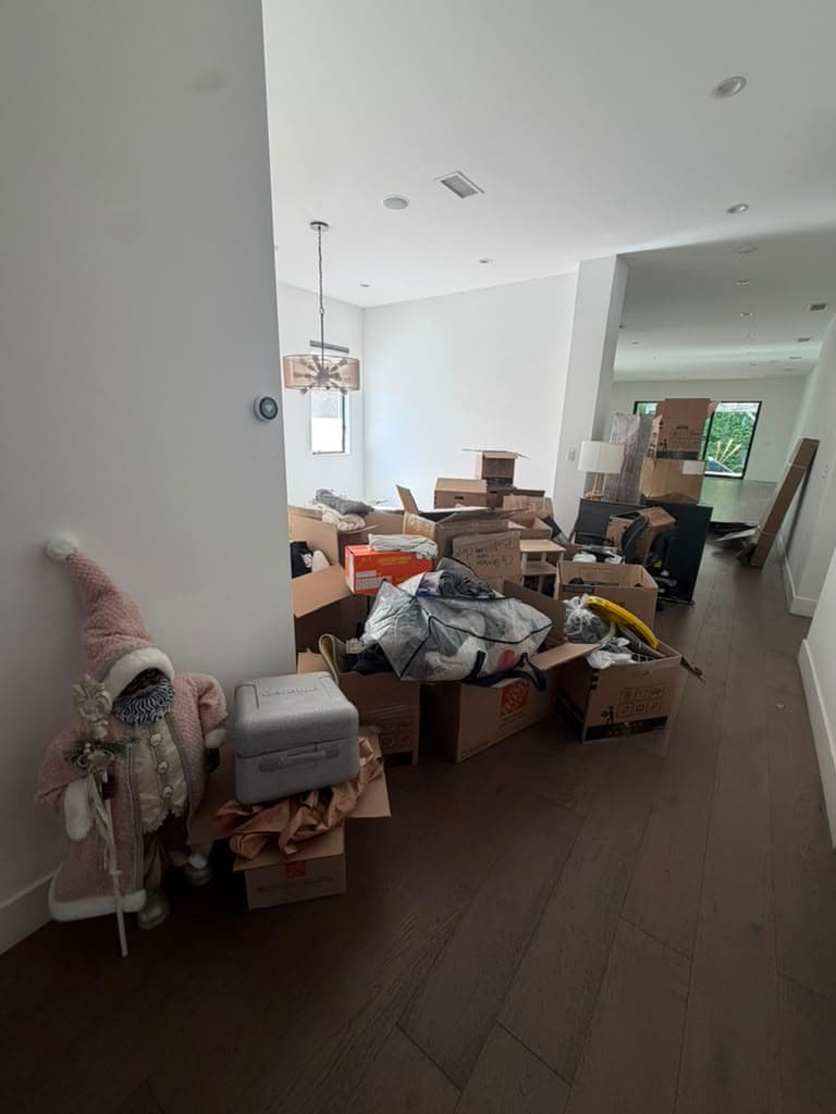 Cluttered room filled with junk and debris before Junk Master arrived for whole-house cleanout in North Hollywood